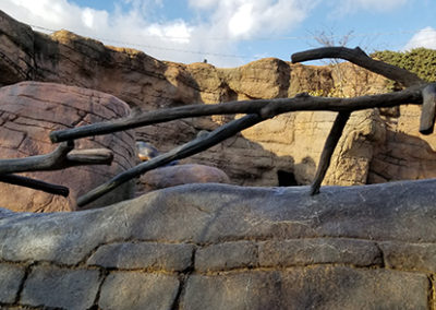 Stainless steel sculpted to look like wood for sea lion exhibit